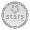 "Sustainability tracking assessment & rating system silver stars a program of aashe" logo