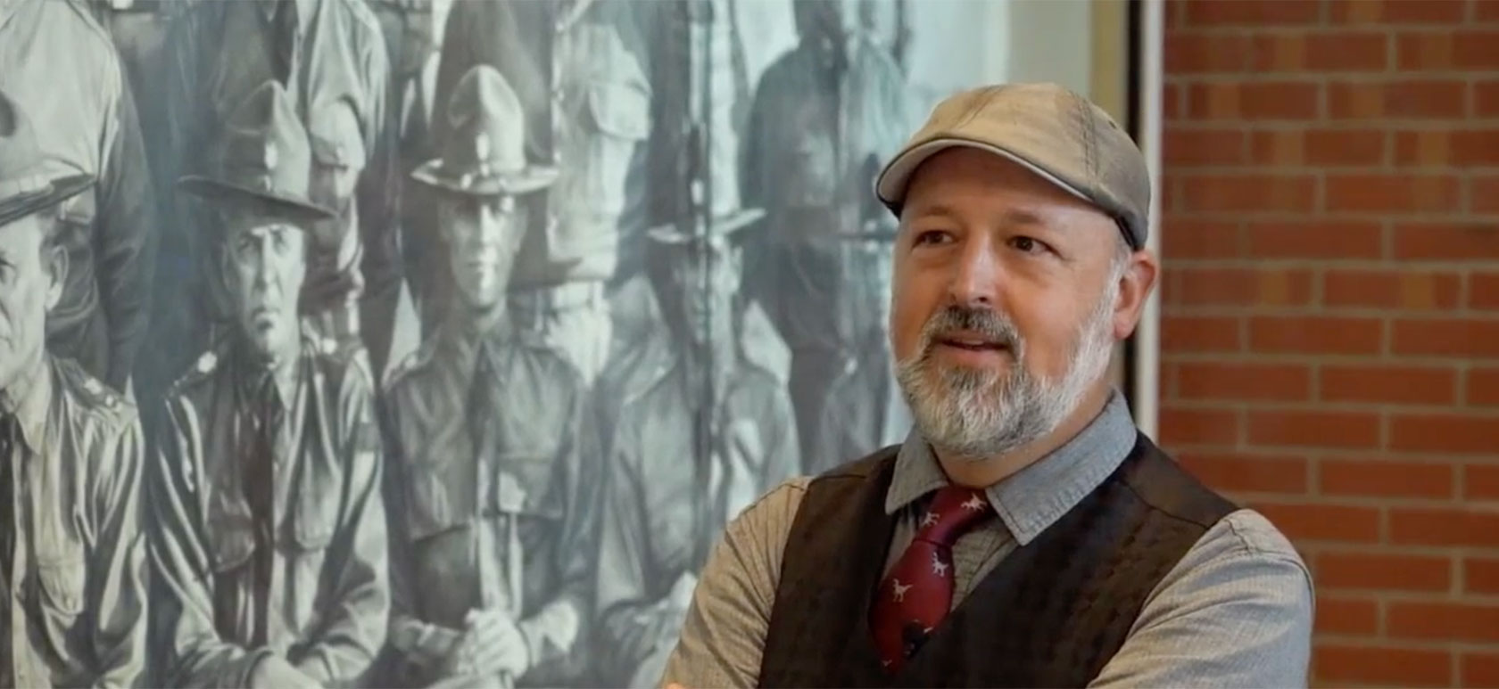 Chris LaPorte in front of his large drawing