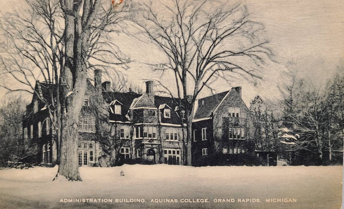 Black and white photo of Holmdene in winter- three story house full of windows with brick walls. Text reads Adminsitration Building Aquinas College Grand Rapids Michigan