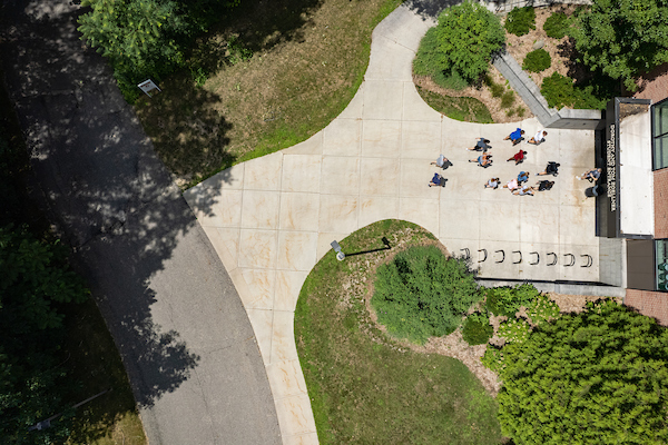Aerial view of group walking on campus