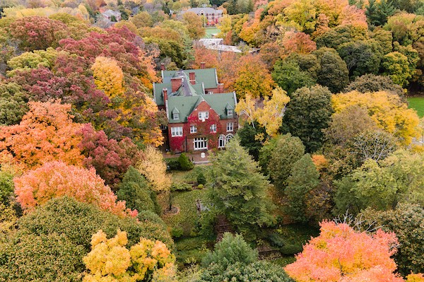 Aerial view of Holmdene Manor surrounded by leaves in the fall