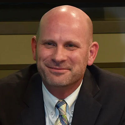 Headshot of Adam Vallus