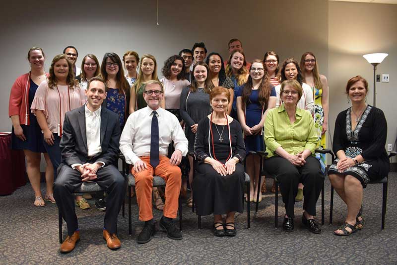 Lambda Pi Eta members at Aquinas College
