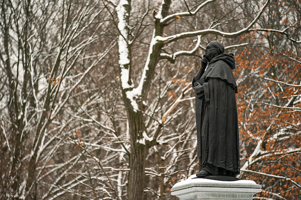Statue of Thomas Aquinas in Winter